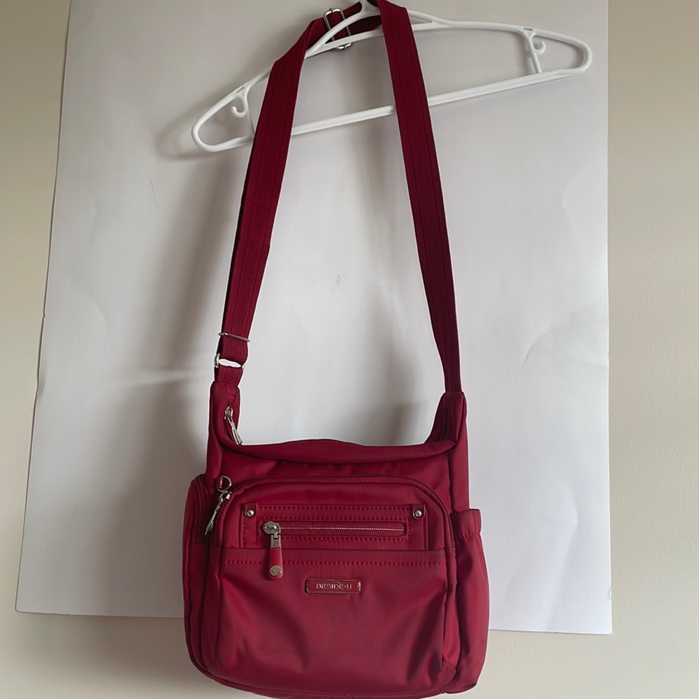 Beside -U red nylon cross body handbag in good condition